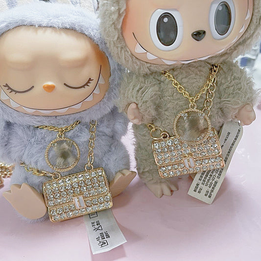 vl bag and necklace